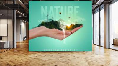 World environment day text with a hand and nature landscape creative concept image manipulation.  Wall mural