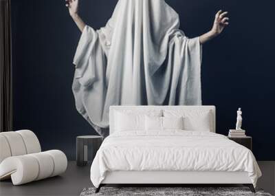 Sexy Girl with long legs in costume Spooky white ghost. Halloween minimal concept Wall mural