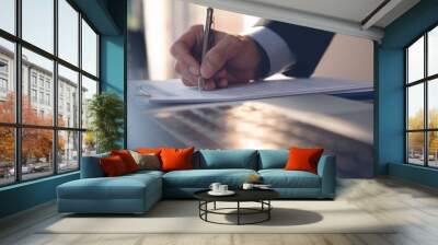 Businessman working in modern office Wall mural