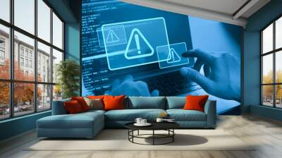 Cyber security concept. Man using computer with system hacked alert due to cyber attack on computer network. Data Protection. Internet virus cyber security and cybercrime Wall mural