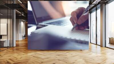 Man hand writing on notebook Wall mural