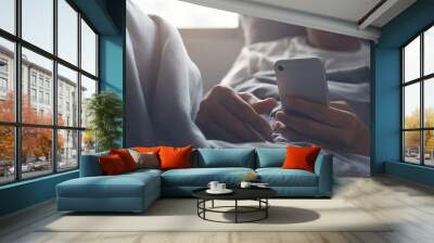 Man using smartphone Wall mural