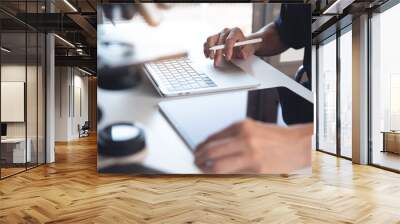 Scientist working on laptop computer and using digital tablet with microscope. Doctor or technician recording lab test on tablet pc in hospital laboratory Wall mural