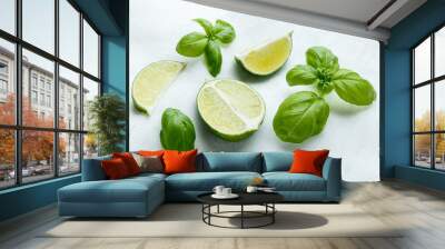 fresh basil and lime on white background Wall mural