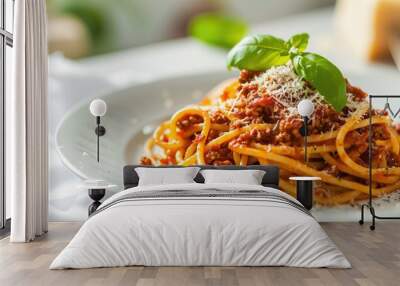 Spaghetti bolognese served in the white plate on the white table Wall mural