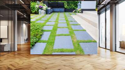 Stone slabs on the grass in the garden Wall mural