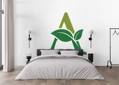 tree leaf logo design with letter logo a consept premium vector Wall mural