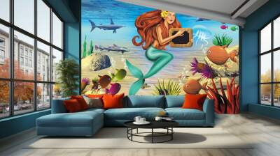 young cartoon mermaid and tropical fish in aquarium Wall mural