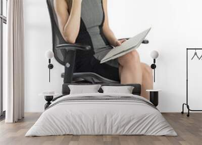 Confident Businesswoman With File Sitting On Office Chair Wall mural