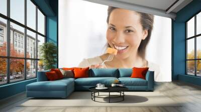 Woman Eating Fresh Fruit Salad At Home Wall mural