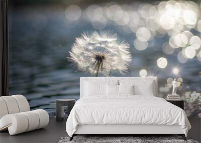 Dandelion seed head glistening by the water. Wall mural