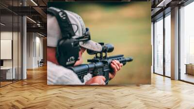 hunter aiming rifle Wall mural