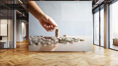 Group of coin with hand. Wall mural