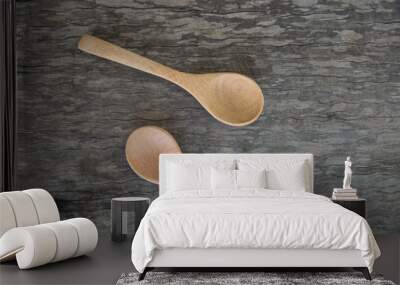 Spoon wood on wooden texture. Wall mural