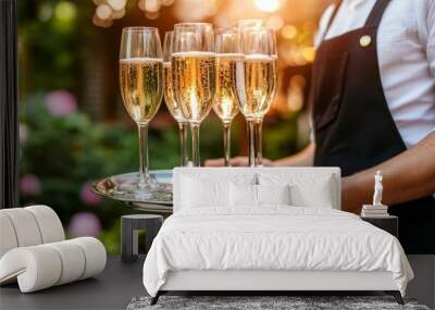 Champagne glasses outside. Wall mural