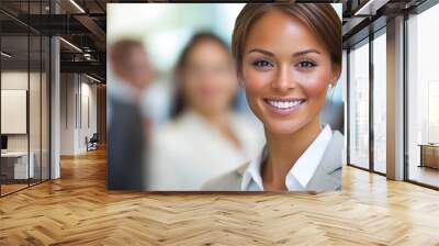 Smiling businesswoman and team Wall mural