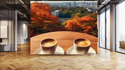 Perfect autumn morning with two cups of coffee overlooking a beautiful cityscape and vibrant fall foliage. Wall mural