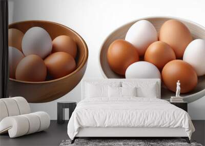 Two bowls filled with brown and white eggs, illustrating a variety of fresh farm eggs ready for cooking or baking. Wall mural