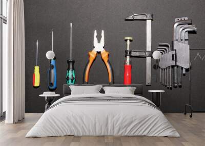 A set of new hand tools on a black background. Wall mural