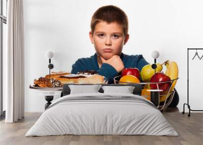 a boy's choice of a healthy or unhealthy snack Wall mural