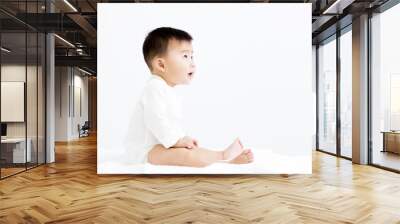 Adorable asian   smiling  baby  boy looking up Wall mural