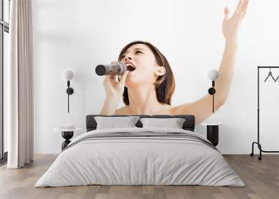 beautiful young woman singing karaoke isolated on white Wall mural