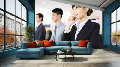 business woman with her staff in conference room Wall mural