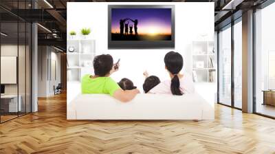 family watching the tv in living room Wall mural