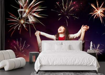 father and daughter looking fireworks in the evening sky Wall mural