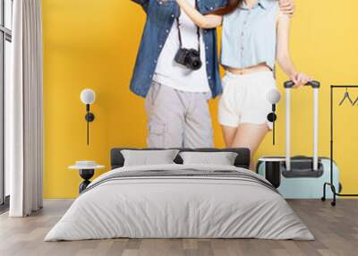 Full length of Asian Couple with travel luggage and camera looking something Wall mural