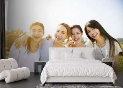 Group of young beautiful women smiling Wall mural