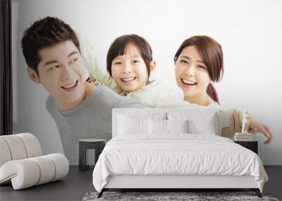 happy attractive young asian family portrait Wall mural