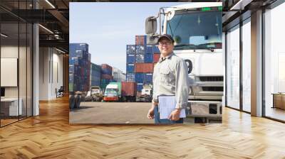 happy driver in front of container truck Wall mural