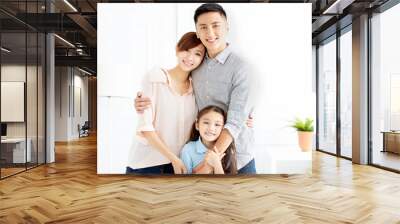 Happy family and child having fun together Wall mural