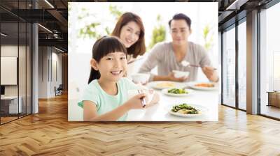 happy young Family enjoy their  dinner Wall mural