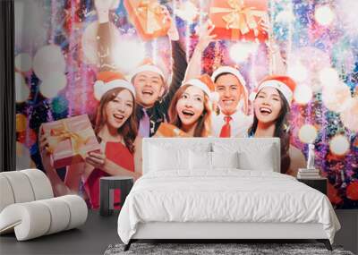 happy young group having fun in christmas party Wall mural