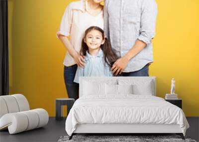 portrait of happy family standing together isolated Wall mural