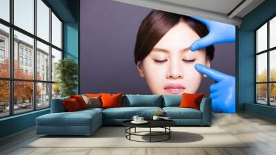 young attractive  woman face and medical beauty concept Wall mural