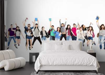 young student group  jumping people isolated on white Wall mural