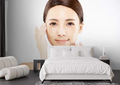 young woman with natural makeup and clean skin Wall mural