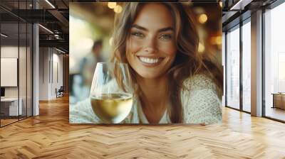 Woman holding a glass of champagne Wall mural