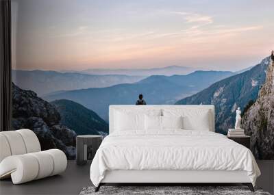 Breathtaking Views From Mangart Peak at Stunning Sunrise. Peaks Above Clouds. Wall mural