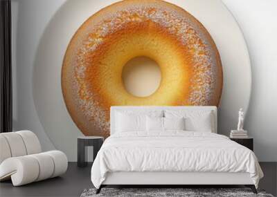 Golden bundt cake with powdered sugar on white plate Wall mural