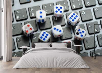 A set of simple small game dice showing different numbers laying on a laptop computer keyboard, random numbers generation, chance, luck, drawing. Randomness, online lottery gambling chances, entropy Wall mural