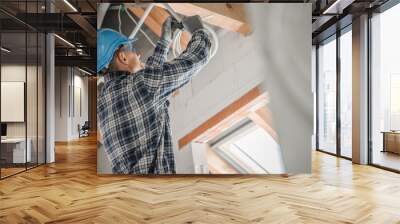 Electric Contractor Worker Installing Ceiling Light Point Wall mural