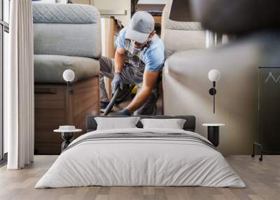 Worker Vacuuming and Cleaning Rental RV Motor Home Wall mural