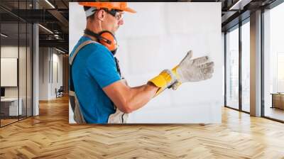 Worker Wearing Safety Gloves Wall mural