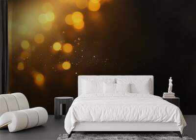 abstract bokeh background of golden light burst. Wall mural