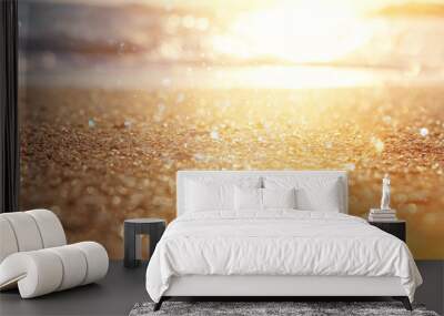 background image of sandy beach and ocean waves with bright bokeh lights Wall mural