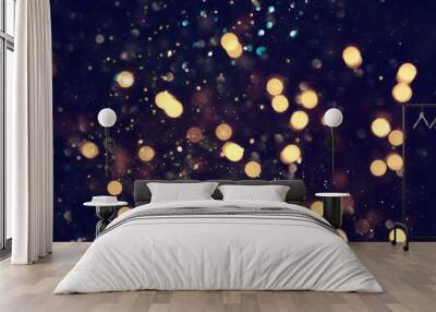 background of abstract glitter lights. blue, gold and black. de focused. banner Wall mural